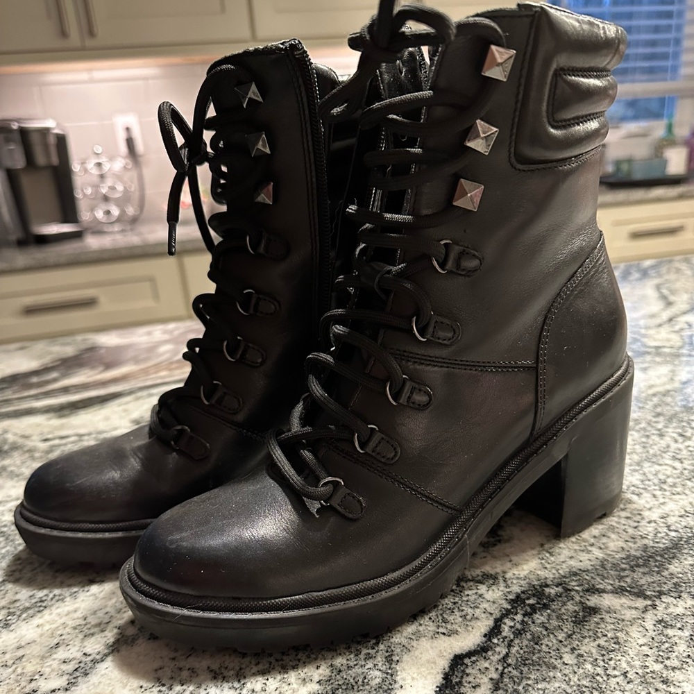 Marc Fisher black leather boots . Lightly worn .